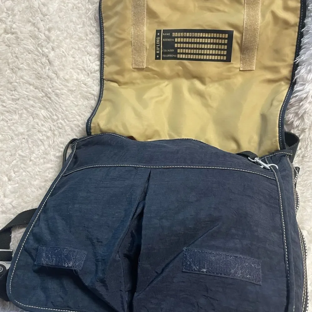 Kipling Nylon Expandable Navy Blue Large Messenger Bag  Key Clip. Black strap .